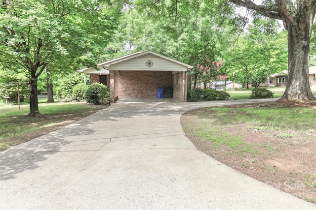 783 Carpenter Ave, Mooresville, NC 28115 - view of community with concrete driveway, a carport, and a yard