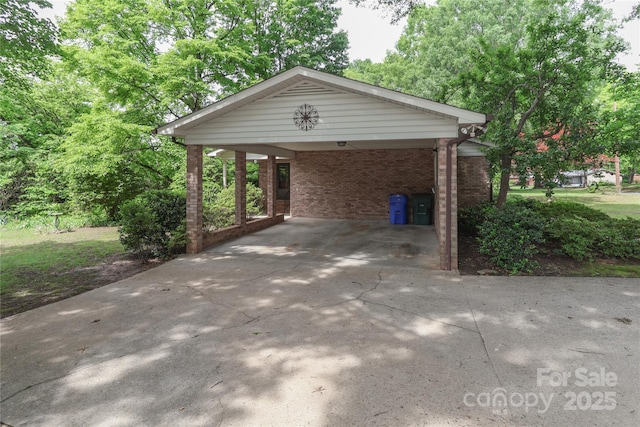 783 Carpenter Ave, Mooresville, NC 28115 - view of car parking with concrete driveway and a carport