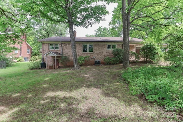 783 Carpenter Ave, Mooresville, NC 28115 - rear view of property featuring brick siding, cooling unit, crawl space, and a chimney