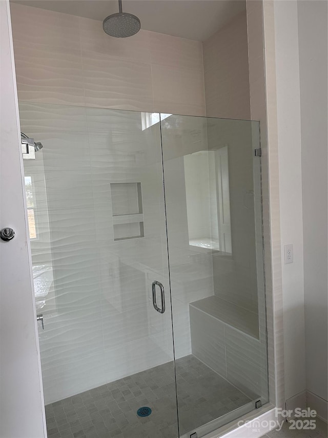 full bath featuring a stall shower