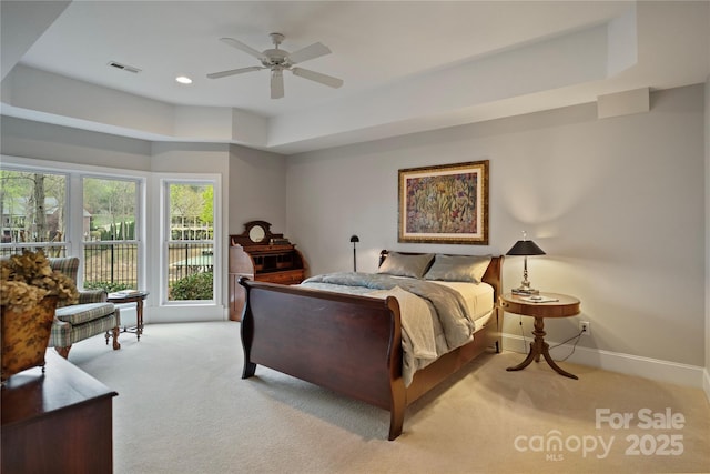 bedroom featuring visible vents, baseboards, recessed lighting, a ceiling fan, and light colored carpet