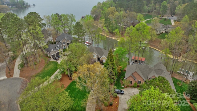 aerial view featuring a residential view and a water view