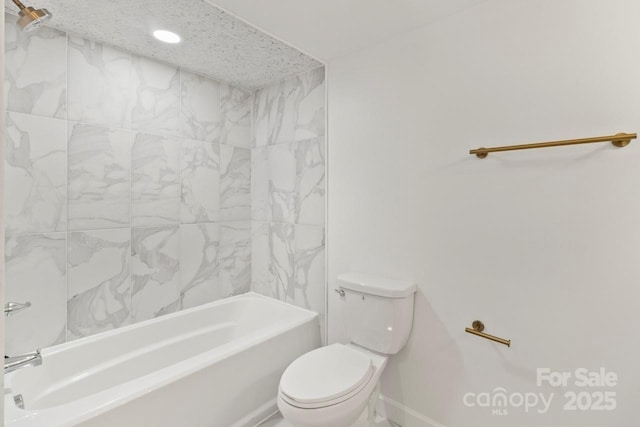 bathroom featuring toilet, recessed lighting, baseboards, and shower / bath combination