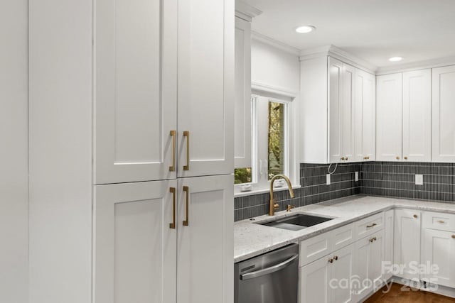 6614 Old Providence Rd, Charlotte, NC 28226 - kitchen with dishwasher, a sink, decorative backsplash, white cabinetry, and light stone countertops