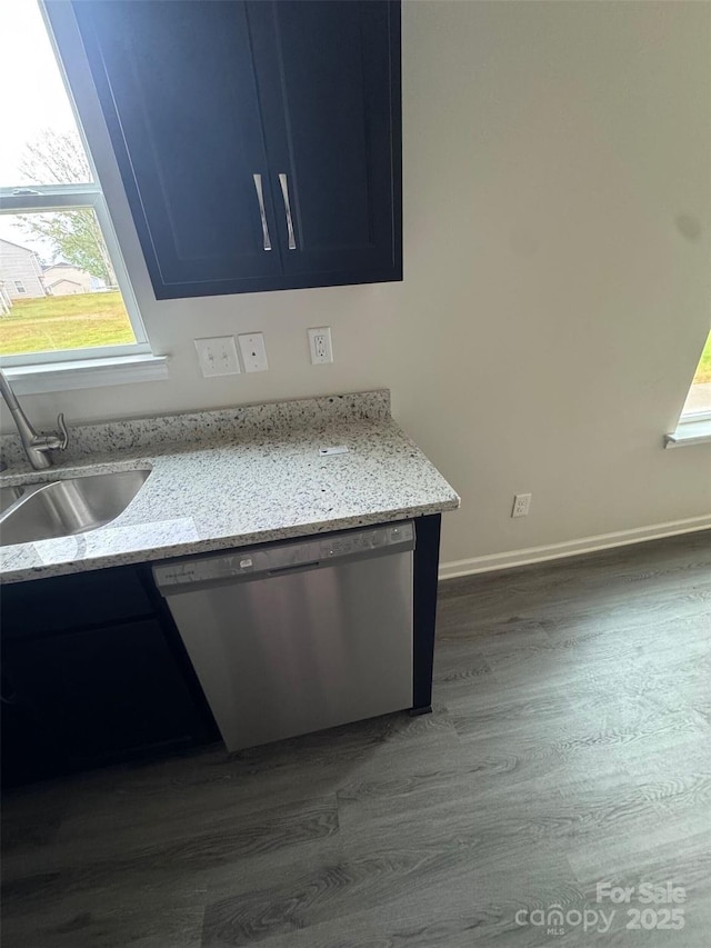 436 Phifer Rd, Kings Mountain, NC 28086 - kitchen with dishwasher, dark wood-type flooring, plenty of natural light, and light stone counters