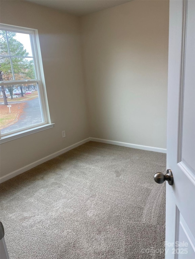 436 Phifer Rd, Kings Mountain, NC 28086 - carpeted empty room with baseboards