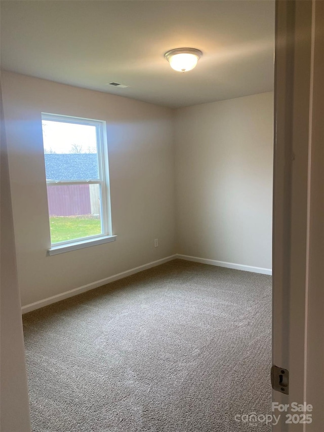436 Phifer Rd, Kings Mountain, NC 28086 - carpeted empty room with baseboards