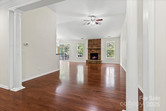 9506 Minnie Lemmond Ln Unit 170, Mint Hill, NC 28227 - unfurnished living room featuring wood finished floors, ceiling fan, baseboards, and a fireplace