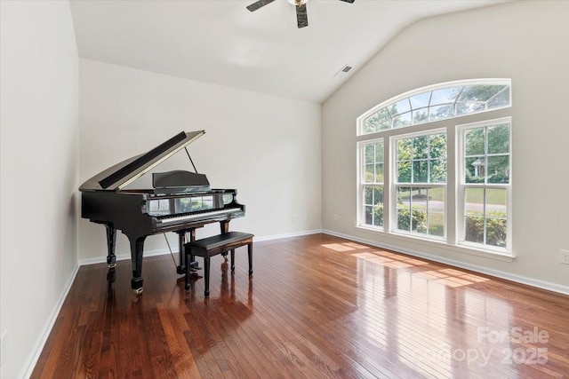 9506 Minnie Lemmond Ln Unit 170, Mint Hill, NC 28227 - sitting room with hardwood / wood-style flooring, vaulted ceiling, a ceiling fan, and baseboards