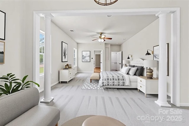 9506 Minnie Lemmond Ln Unit 170, Mint Hill, NC 28227 - bedroom featuring ornate columns, carpet flooring, baseboards, and ceiling fan