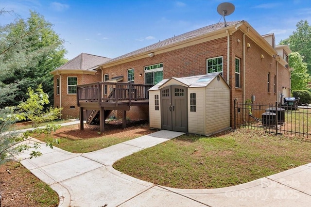 9506 Minnie Lemmond Ln Unit 170, Mint Hill, NC 28227 - back of property featuring a shed, a deck, an outbuilding, and brick siding