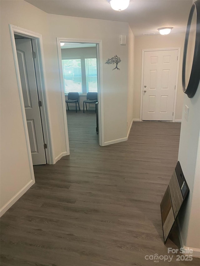 438 Phifer Rd, Kings Mountain, NC 28086 - hallway featuring dark wood-style flooring