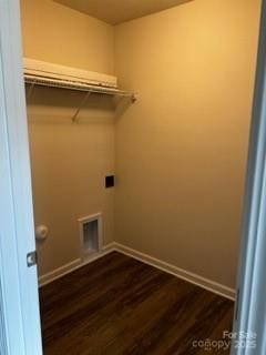 438 Phifer Rd, Kings Mountain, NC 28086 - laundry area featuring baseboards and dark wood-style flooring