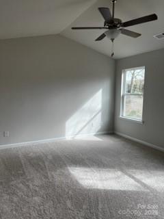 438 Phifer Rd, Kings Mountain, NC 28086 - empty room featuring carpet, ceiling fan, and lofted ceiling