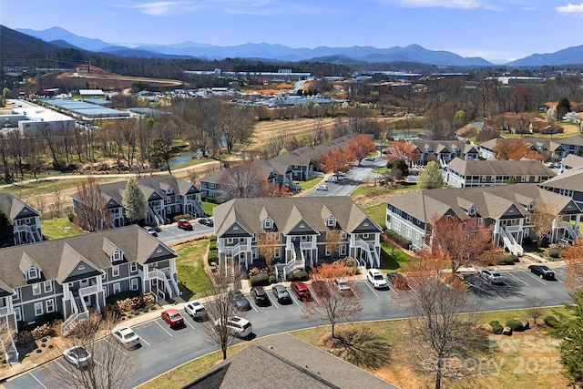 drone / aerial view with a residential view and a mountain view