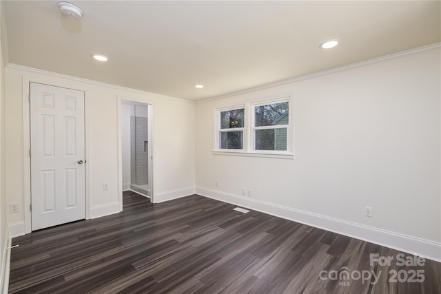 2741 Cowles Rd, Charlotte, NC 28208 - unfurnished room featuring baseboards, crown molding, recessed lighting, and dark wood-style flooring