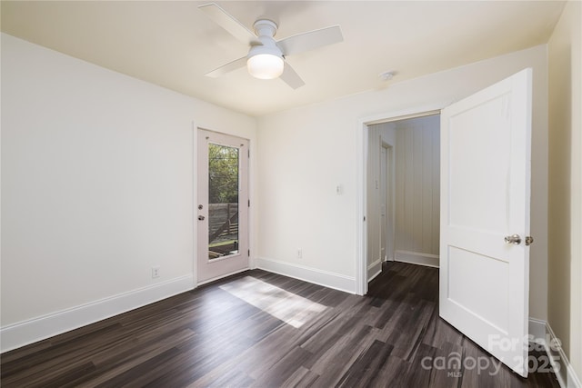 2741 Cowles Rd, Charlotte, NC 28208 - empty room featuring a ceiling fan, dark wood-type flooring, and baseboards
