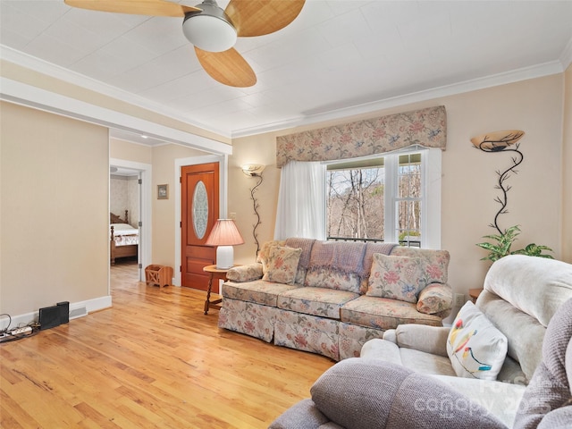 195 Nature Ln, Waynesville, NC 28786 - living room featuring baseboards, crown molding, wood finished floors, and a ceiling fan