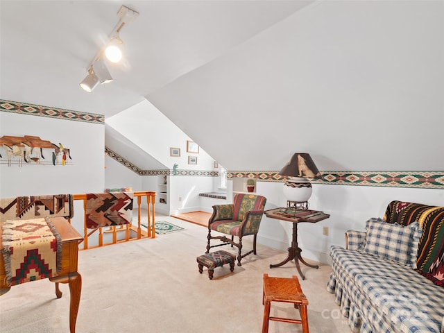 195 Nature Ln, Waynesville, NC 28786 - carpeted living area featuring baseboards and lofted ceiling