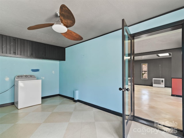 195 Nature Ln, Waynesville, NC 28786 - spare room featuring a ceiling fan, light floors, a textured ceiling, washer / dryer, and baseboards