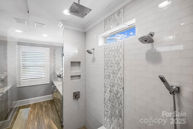 1311 Sunnys Halo Ln, Waxhaw, NC 28173 - full bath with a shower stall, wood finished floors, crown molding, and recessed lighting