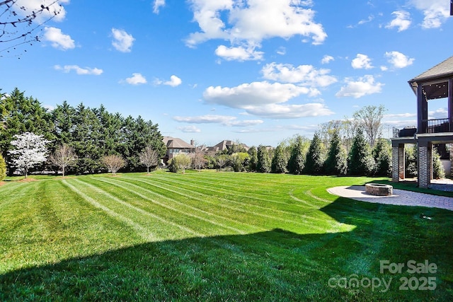 1311 Sunnys Halo Ln, Waxhaw, NC 28173 - view of grassy yard with an outdoor fire pit