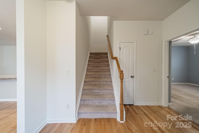 9001 Lanark Ln, Indian Land, SC 29707 - stairs with wood finished floors, a ceiling fan, and baseboards