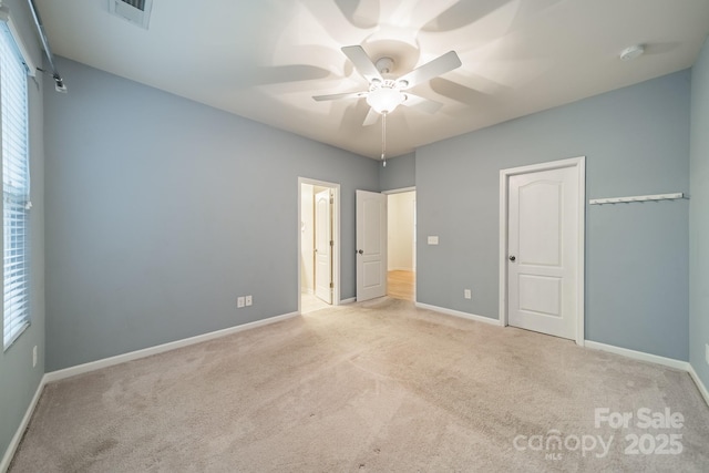 9001 Lanark Ln, Indian Land, SC 29707 - unfurnished bedroom featuring carpet floors, baseboards, and multiple windows