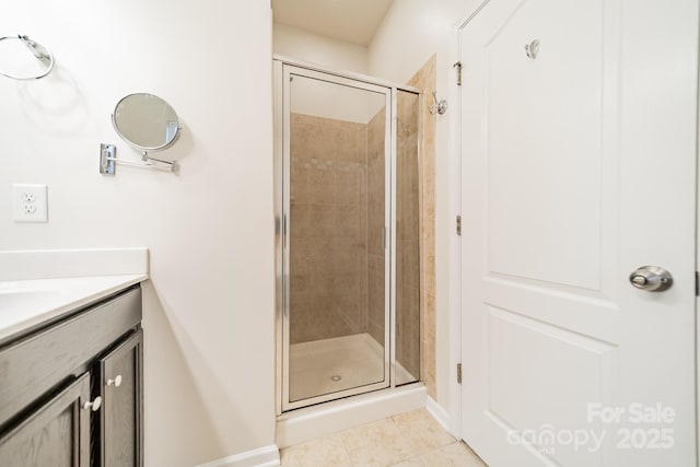 9001 Lanark Ln, Indian Land, SC 29707 - full bathroom featuring vanity, a shower stall, tile patterned floors, and baseboards