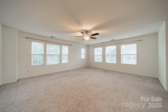 9001 Lanark Ln, Indian Land, SC 29707 - unfurnished room featuring a ceiling fan, light carpet, and baseboards