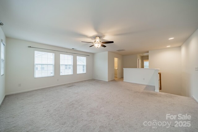 9001 Lanark Ln, Indian Land, SC 29707 - spare room featuring light colored carpet, a ceiling fan, baseboards, and recessed lighting