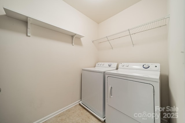 9001 Lanark Ln, Indian Land, SC 29707 - laundry room with separate washer and dryer and baseboards