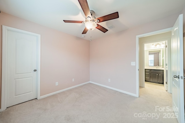 9001 Lanark Ln, Indian Land, SC 29707 - unfurnished bedroom featuring light carpet, baseboards, a sink, and ceiling fan