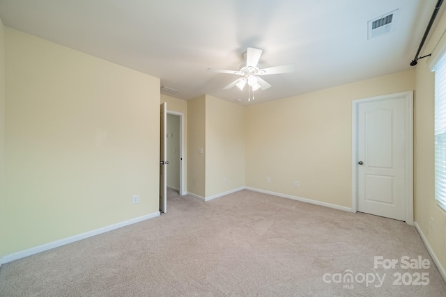 9001 Lanark Ln, Indian Land, SC 29707 - unfurnished room with light carpet, ceiling fan, and baseboards