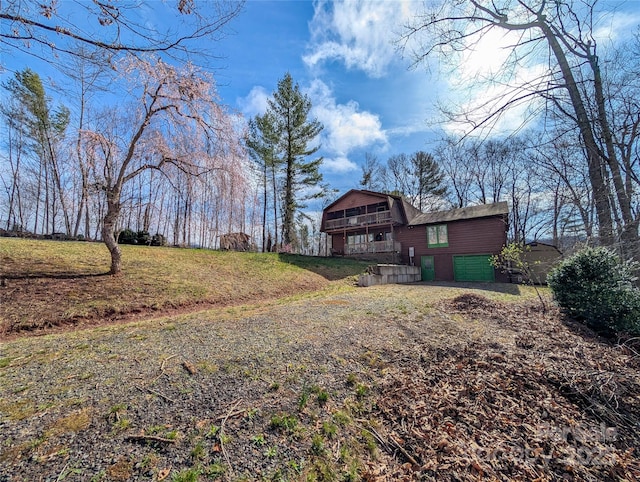 view of yard featuring a garage