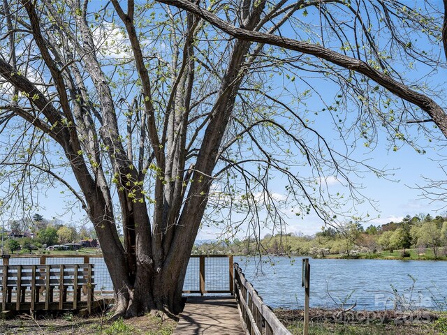 view of dock with a water view