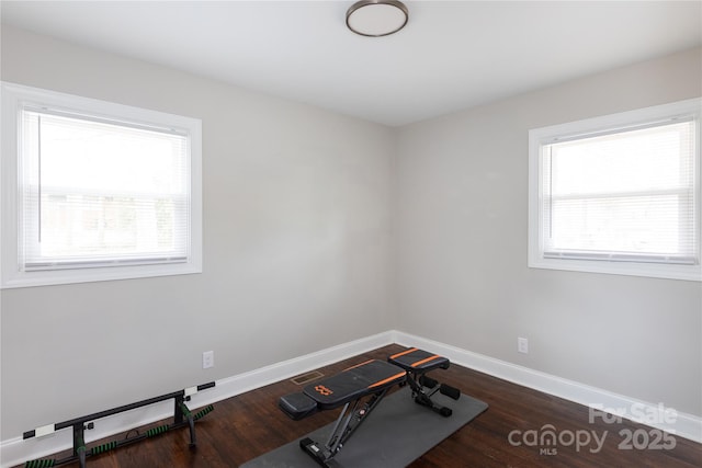 2408 Dora Dr, Charlotte, NC 28215 - workout area featuring healthy amount of natural light, baseboards, and wood finished floors