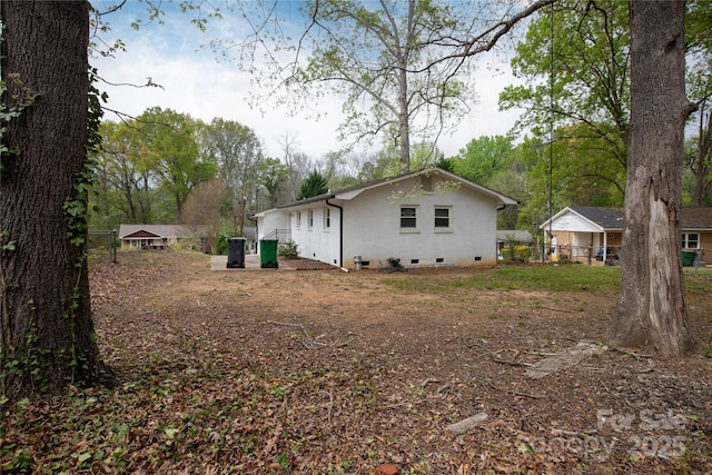 2408 Dora Dr, Charlotte, NC 28215 - view of side of home with crawl space and fence