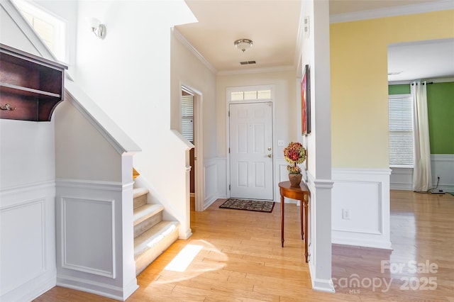 7554 Coastal Way, Huntersville, NC 28078 - foyer entrance featuring a healthy amount of sunlight, light wood-style floors, stairway, and visible vents