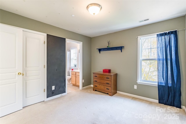 7554 Coastal Way, Huntersville, NC 28078 - bedroom featuring light carpet, baseboards, visible vents, and ensuite bath