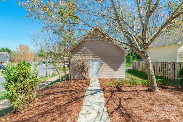 7554 Coastal Way, Huntersville, NC 28078 - rear view of property featuring an outbuilding and fence