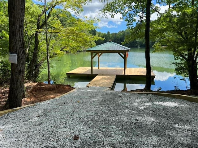 view of dock with a water view