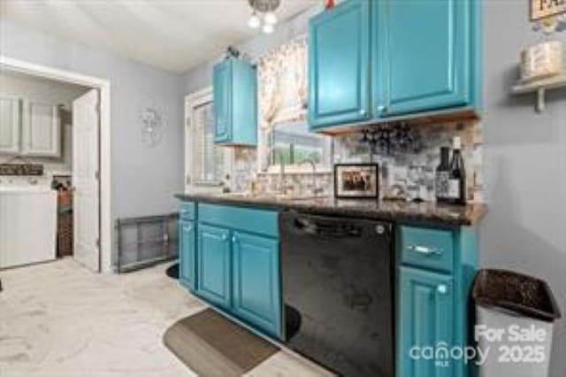 kitchen with washer / clothes dryer, blue cabinets, black dishwasher, and tasteful backsplash