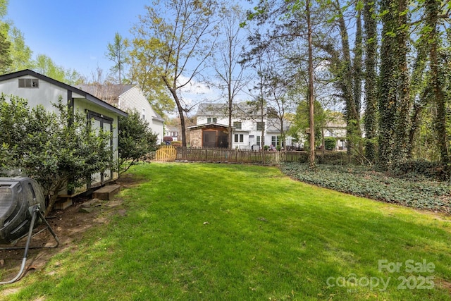 view of yard featuring fence