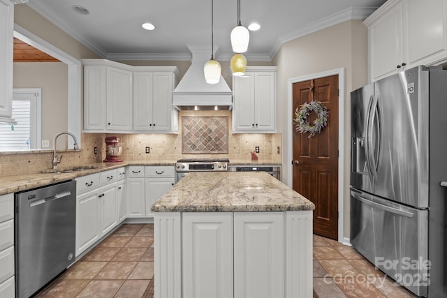 kitchen featuring stainless steel appliances, a kitchen island, white cabinetry, a sink, and custom range hood