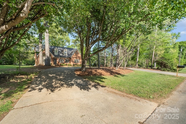 119 Lakenheath Ln, Matthews, NC 28105 - view of front of home with driveway and a front yard