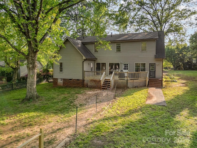 119 Lakenheath Ln, Matthews, NC 28105 - back of house with roof with shingles, crawl space, a yard, a deck, and fence