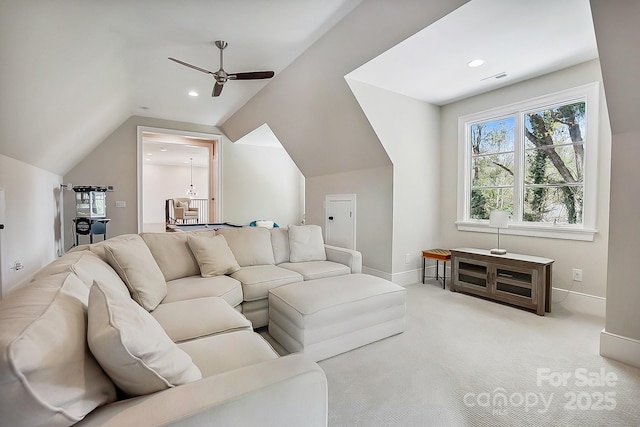 carpeted living room featuring vaulted ceiling, recessed lighting, baseboards, visible vents, and ceiling fan
