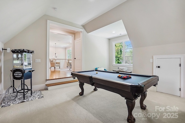 rec room featuring light carpet, billiards, baseboards, and vaulted ceiling