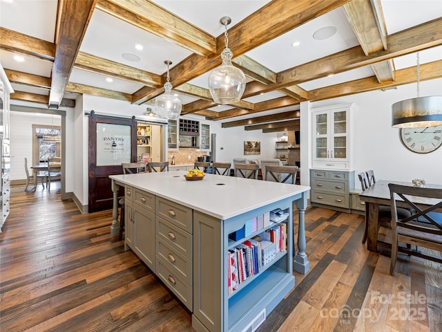 59 W Bradford Hill Rd, Mills River, NC 28759 - kitchen featuring a barn door, gray cabinets, and coffered ceiling